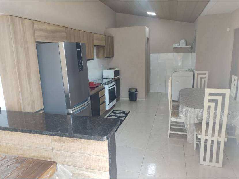 Sobrado com Piscina em Guaratuba/PR – Conforto, Lazer e Investimento - Mauro Alexandre Imóveis